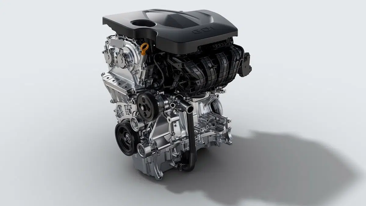 Vista del motor de gasolina del MG3, que ilustra su simplicidad mecánica.