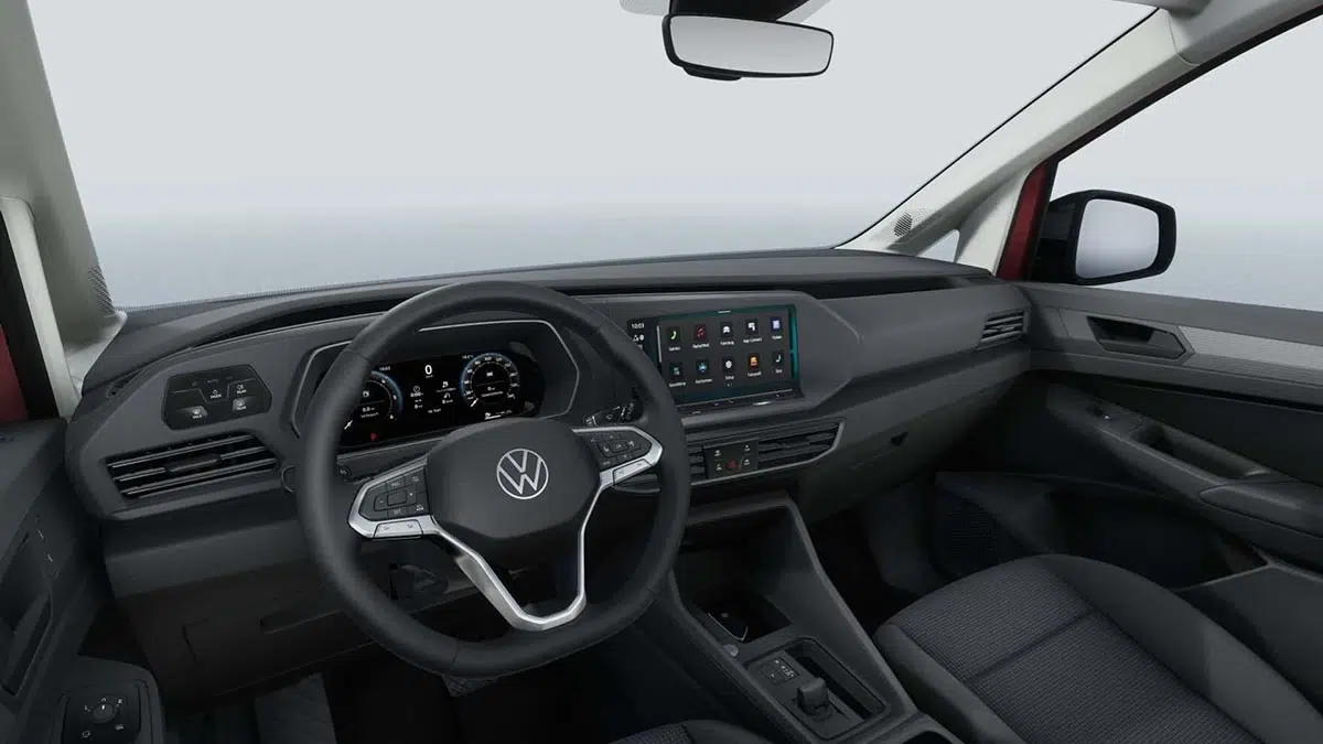 Interior del Caddy eHybrid, con una pantalla táctil moderna y conectividad avanzada.