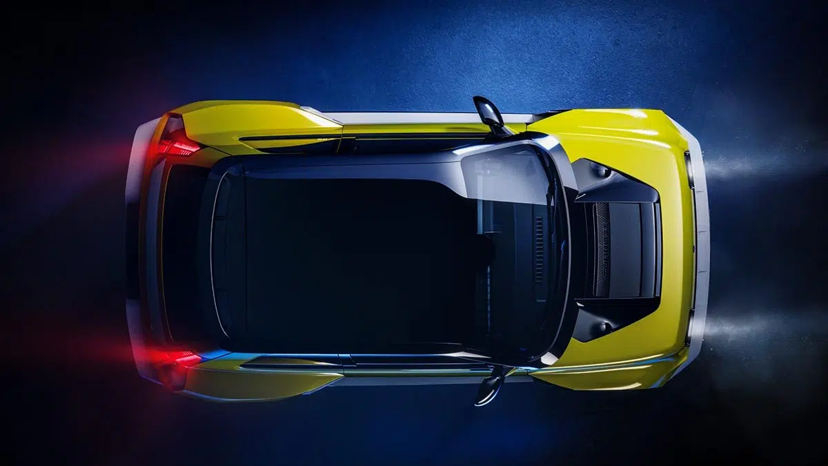 Vue aérienne du Renault 5 Turbo 3E, design musclé avec ailes élargies et aileron imposant