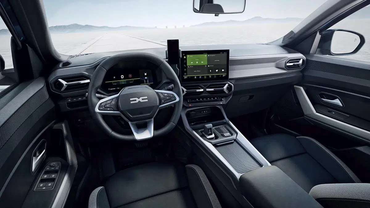 Interior del Dacia Bigster GLP 2025 con instrumentación digital y pantalla central